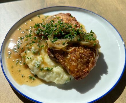 Crispy Chicken Thighs with Champ and Onion Gravy
